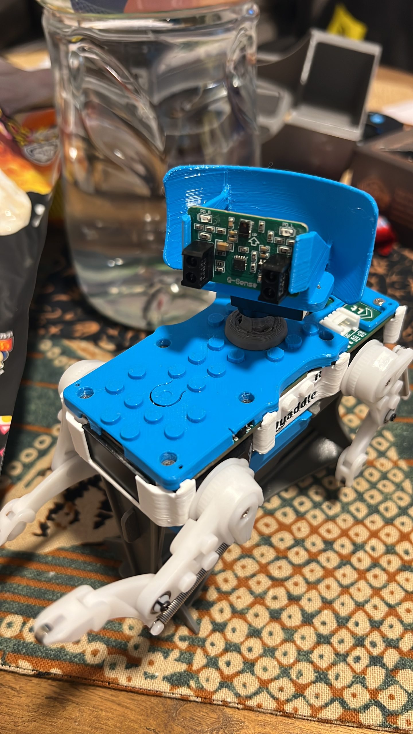 Cloof Siu teaching a micro:bit robotics lesson on a school campus